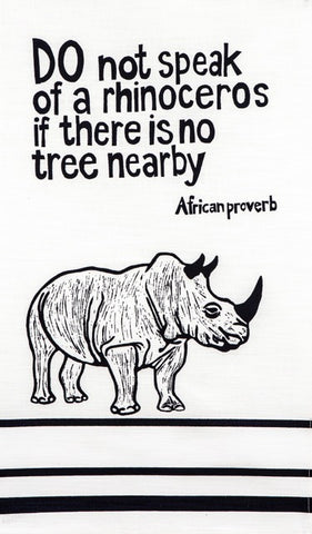 fair trade hand printed african proverb tea towels feat. rhinoceros and text saying" do not speak of a rhinoceros if there is no tree nearby" in black